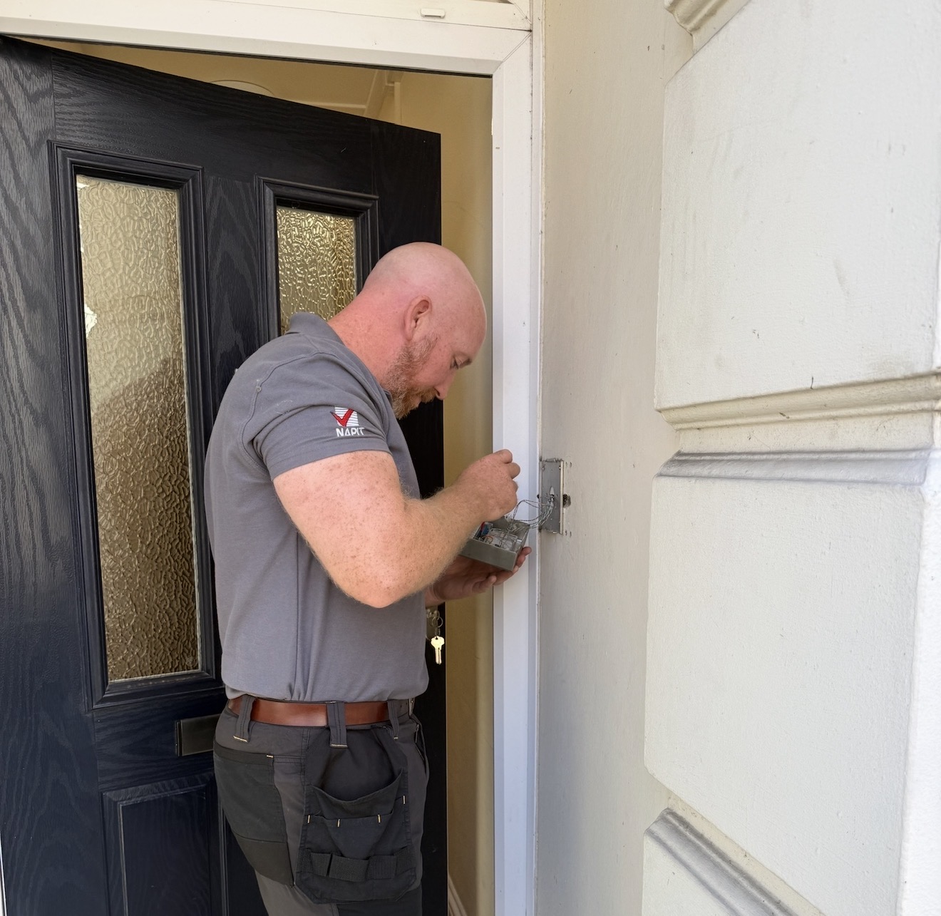 Danny Watson working on a door entry system