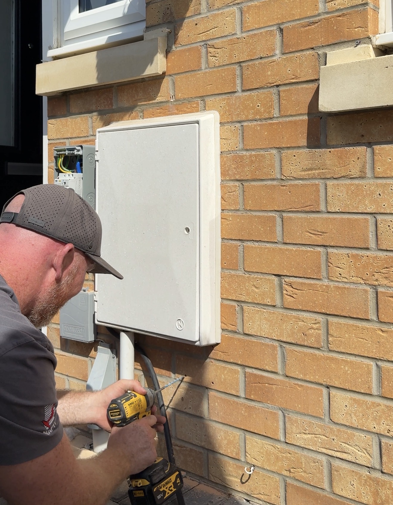 Propcare EFS engineer installing external electrical equipment